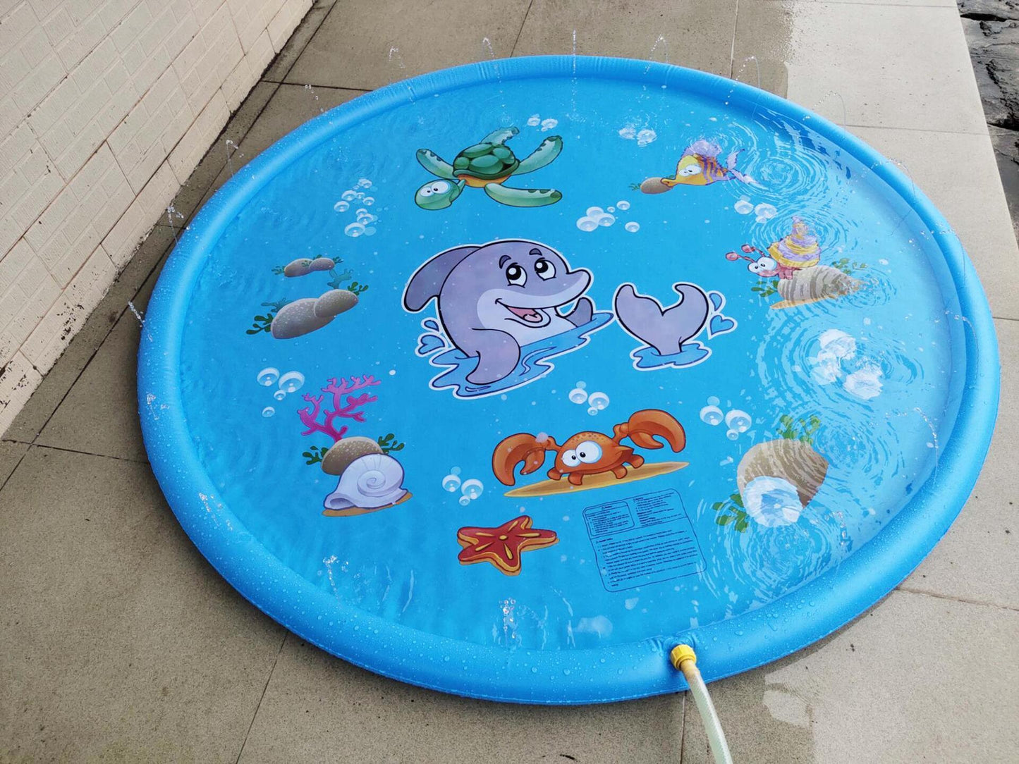 Alfombrilla de piscina con rociador de agua para niños duradera y resistente al agua