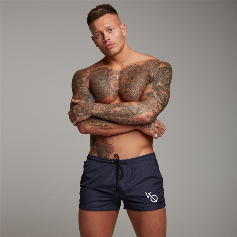 Nuevo traje de baño sexy para hombre, bañador para hombre, pantalones cortos de baño para hombre, calzoncillos para hombre, pantalones cortos de playa, trajes deportivos, pantalones cortos para tabla de surf, bañadores para hombre