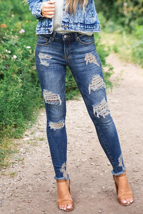 Vaqueros ajustados desgastados con estampado de leopardo en azul oscuro para mujer